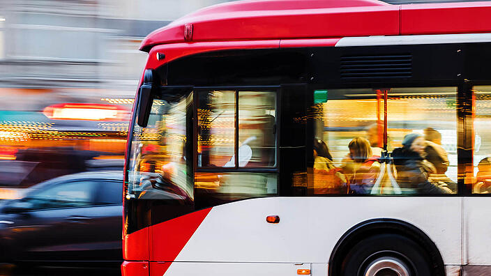 driving bus in the city at night