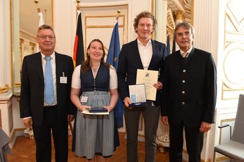 Michaela Eschle und Philipp Metzger, Foto: Tino Lex Drei Männer und eine Frau stehen nebeneinander