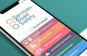 Smartphone mit German Road Safety App auf Ukrainisch