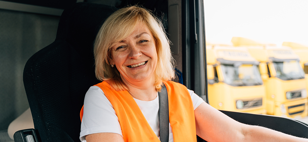 Happy middle age female trucker portrait